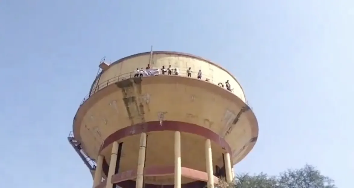 rajiv-gandhi-yuva-mitra-climbed-water-tank-amid-protest-in-rajasthan
